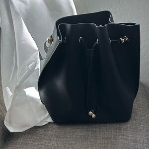Tde bag with crossbody and short handle strap